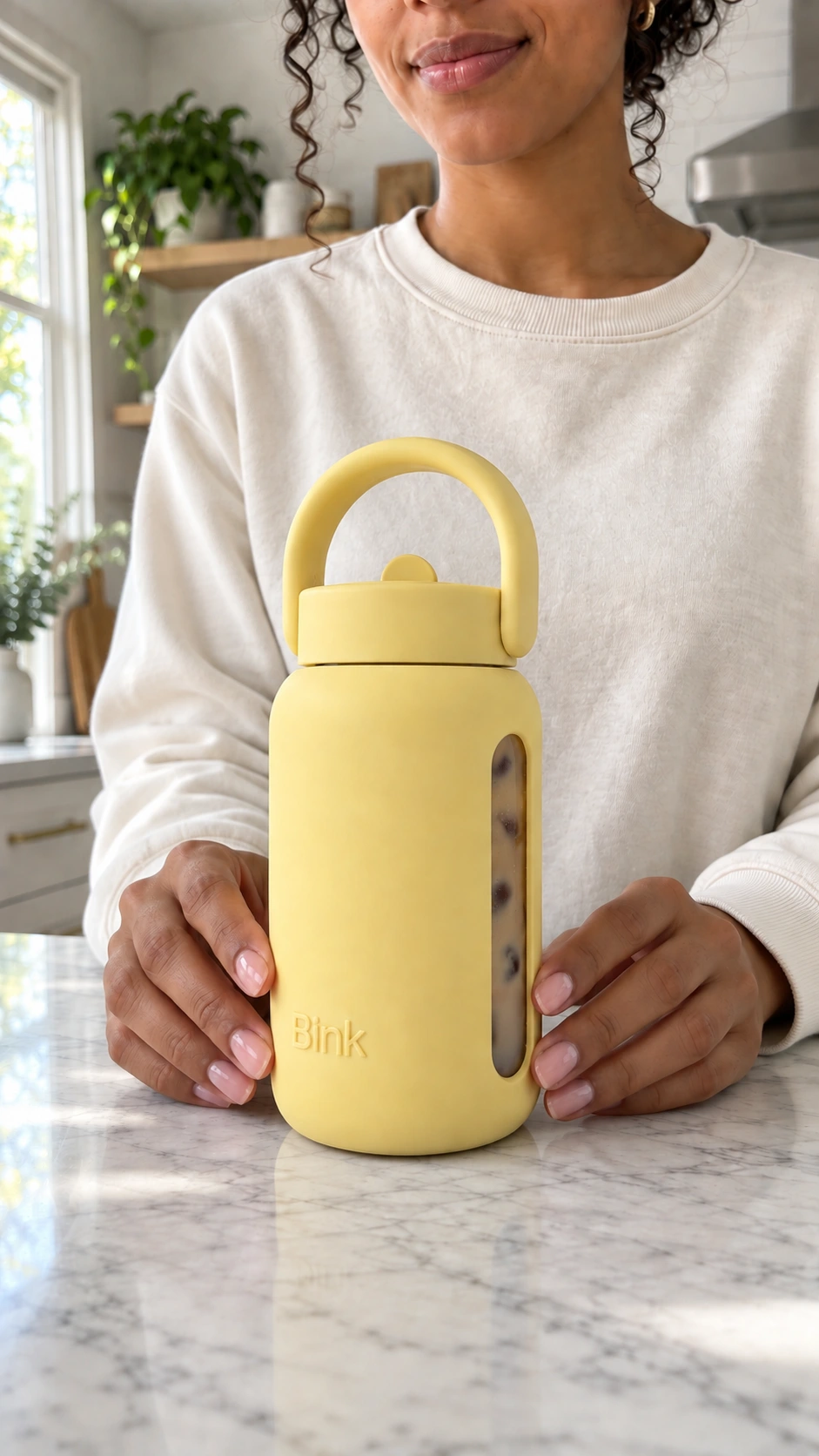 Reference image of the bottle on the counter filled with all the poured contents