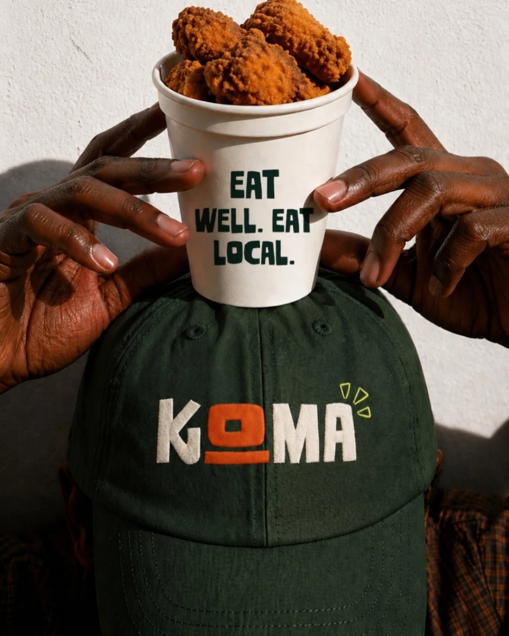 KOMA cap mockup with fried chicken bucket