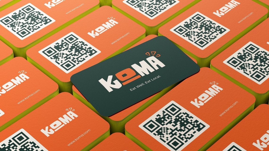 KOMA logo on cream background